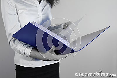 Businesswoman Holding a Binder Stock Photo