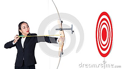 Businesswoman holding bow and shooting to archery target success Stock Photo