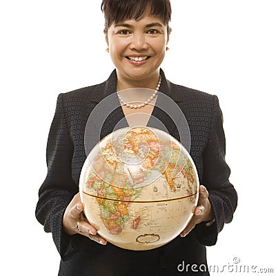 Businesswoman holding globe. Stock Photo