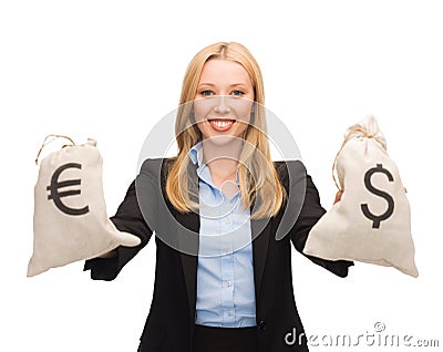 Businesswoman holding money bags with euro Stock Photo