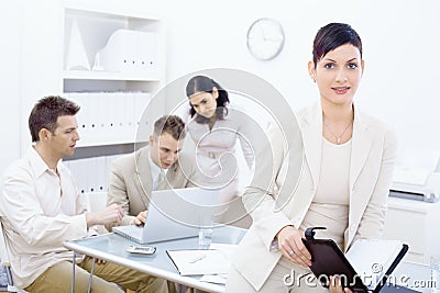 Businesswoman holding organizer Stock Photo