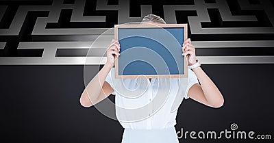 Businesswoman holding slate in front of face Stock Photo