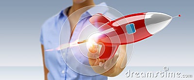 Businesswoman holding and touching a rocket 3D rendering Stock Photo