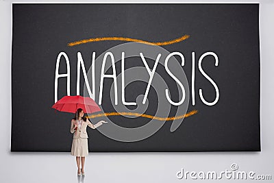 Businesswoman holding umbrella against analysis Stock Photo