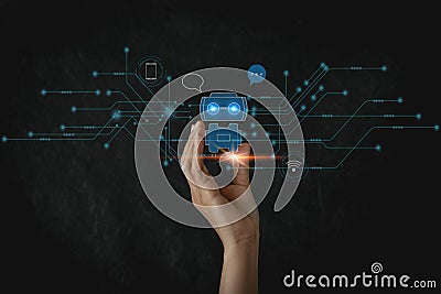 Businesswoman holding a virtual hologram .Hand touching digital chatbot for provide access to information? Stock Photo