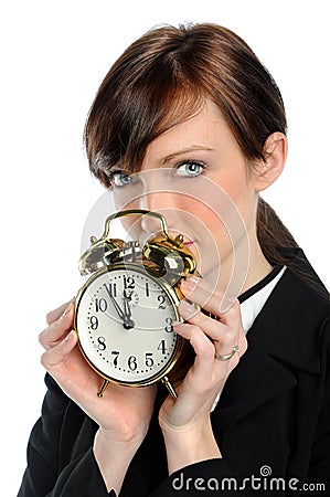 Businesswoman Holfing Alarm Clock Stock Photo