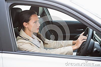 Businesswoman honking the horn Stock Photo