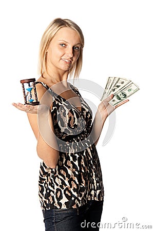 Businesswoman with hourglass and money Stock Photo