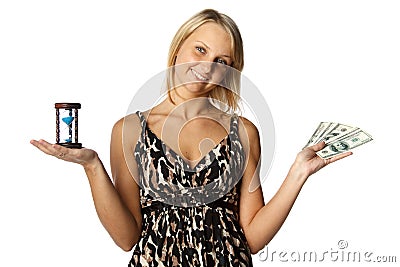 Businesswoman with hourglass and money Stock Photo