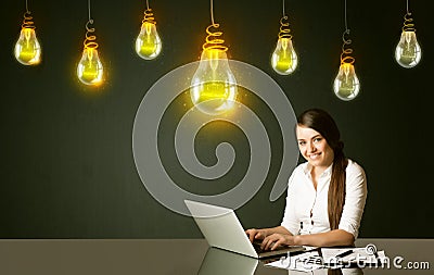 Businesswoman with idea bulbs Stock Photo