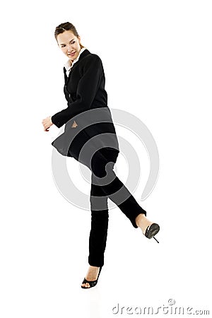 Businesswoman kicking Stock Photo