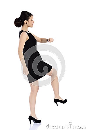 Businesswoman kicking Stock Photo