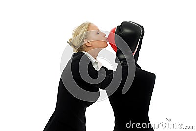 Businesswoman kissing a dummy Stock Photo