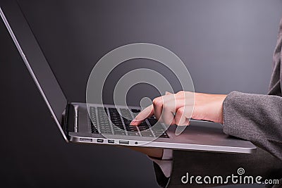 The businesswoman with laptop in business concept Stock Photo