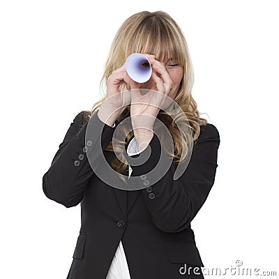 Businesswoman looking through a paper telescope Stock Photo