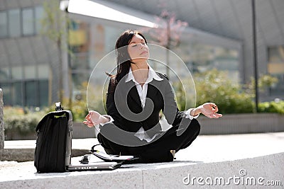 Businesswoman meditating Stock Photo