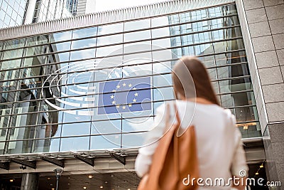 Businesswoman near the parliament building in Brussel Stock Photo