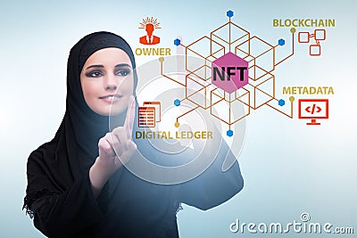 Businesswoman in NFT non fungible concept Stock Photo