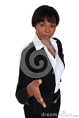 Businesswoman offering her hand Stock Photo