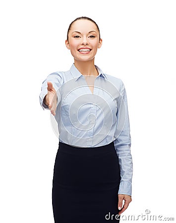 Businesswoman with opened hand ready for handshake Stock Photo