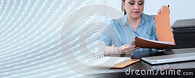 Businesswoman opening folder; panoramic banner Stock Photo