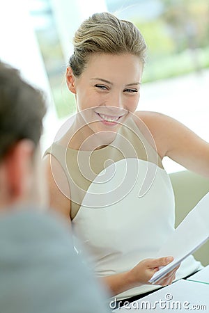 Businesswoman with partners negotiating Stock Photo