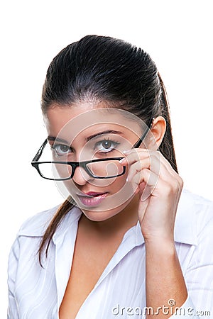 Businesswoman peering over her glasses Stock Photo