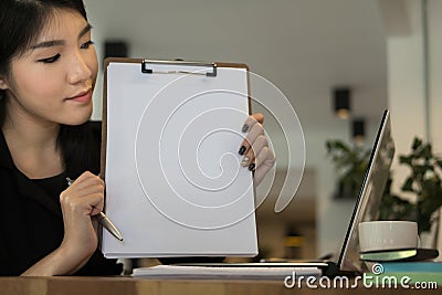 Businesswoman plan new business project at workplace. woman show Stock Photo