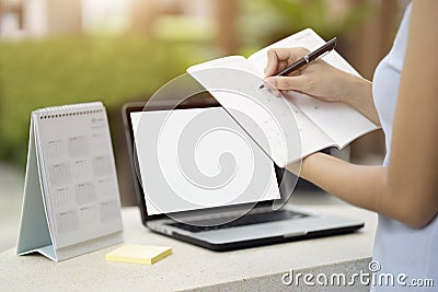 Businesswoman planning agenda and schedule using calendar event Stock Photo