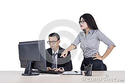 Businesswoman pointing some tasks for her employee Stock Photo