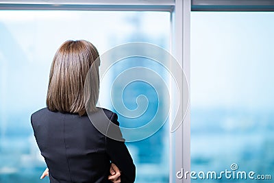 Businesswoman ponder in the office Stock Photo