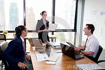 Businesswoman presentation to a group in meeting. Stock Photo