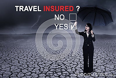 Businesswoman with question of travel insured Stock Photo