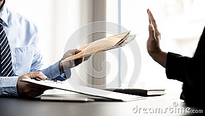 The businesswoman raised her hand to deny this conspiracy and did not accept the money. Stock Photo