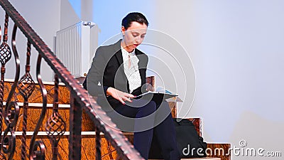 Businesswoman reading financial raport of deadline Stock Photo