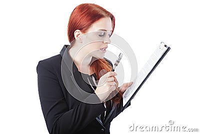 Businesswoman Reading Report with Magnifying Glass Stock Photo