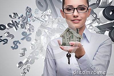 The businesswoman in real estate mortgage concept Stock Photo