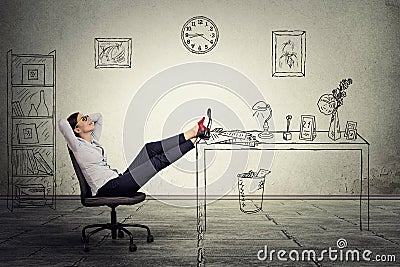 Businesswoman relaxing sitting in the office Stock Photo