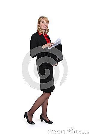 Businesswoman removing document Stock Photo