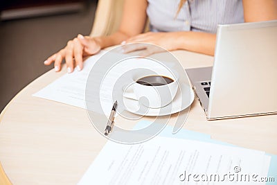 Businesswoman reviewing a contract Stock Photo