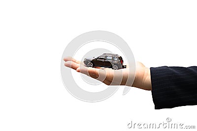 Businesswoman or saleswoman holding miniature car model, auto business, car trading, loans for car concept Stock Photo