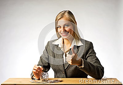 Businesswoman saving money. Stock Photo