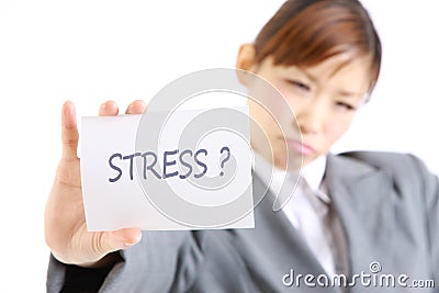businesswoman showing a card with word stress? Stock Photo