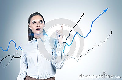 Businesswoman showing growing graph, success Stock Photo