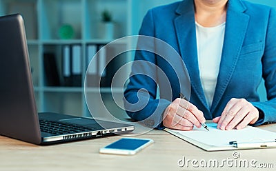 Businesswoman signing business contract agreement Stock Photo