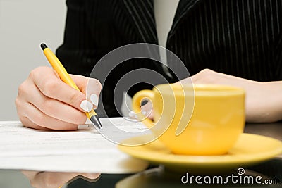 Businesswoman signing contract Stock Photo