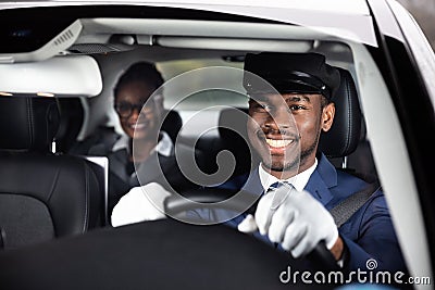 Close-up Of Happy Male Chauffeur Driving Car Stock Photo