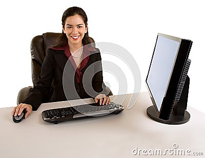 Businesswoman Sitting at her Desk Stock Photo