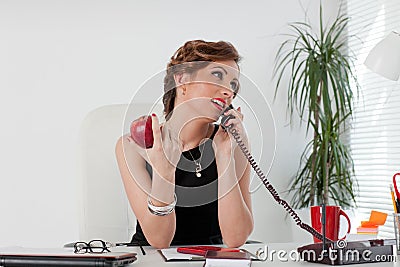 Businesswoman speaks by phone. Stock Photo