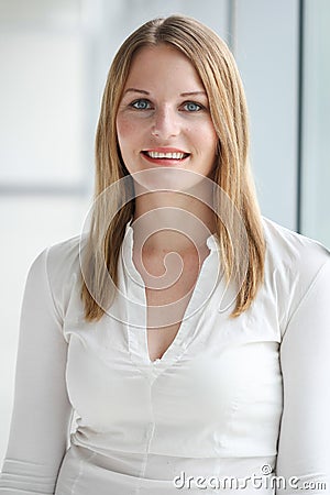 Businesswoman standing in a modern Building Stock Photo